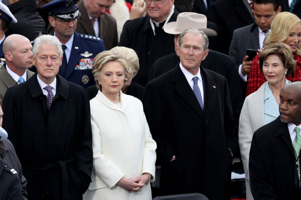 WASHINGTON, DC - JANUARY 20: Former President Bill Clinton (L), former Democratic presidential nominee Hillary Clinton, former President George W. Bush and Laura Bush stand on the West Front of the U.S. Capitol on January 20, 2017 in Washington, DC. In today's inauguration ceremony Donald J. Trump becomes the 45th president of the United States. (Photo by Joe Raedle/Getty Images)